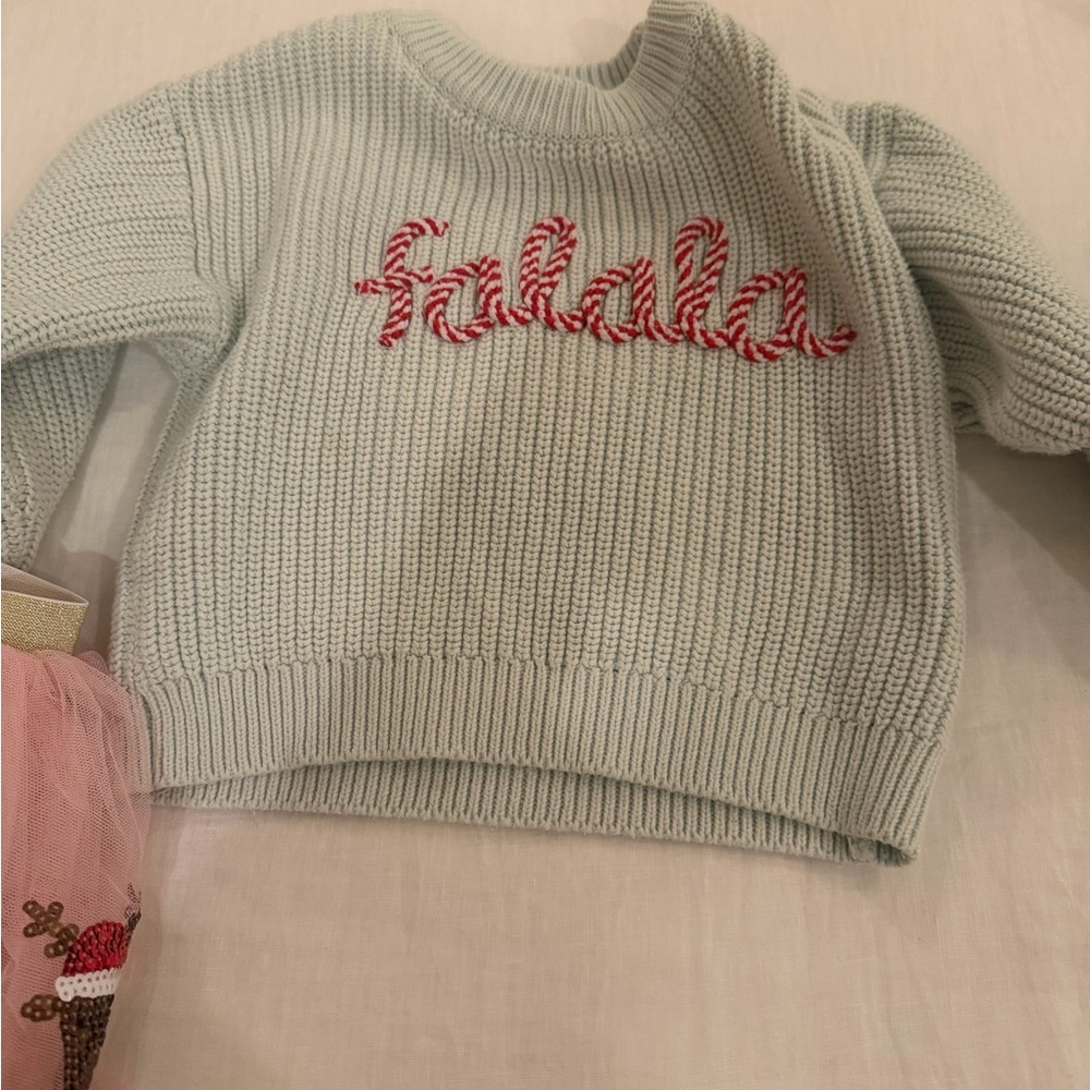 Cozy Light Blue Sweater with Festive Red Detail